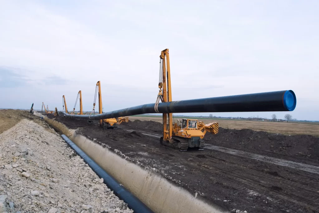 Oil Pipe Welding & Industrial Fabrication Services | TDCO Industrial 2 pipes welding hero